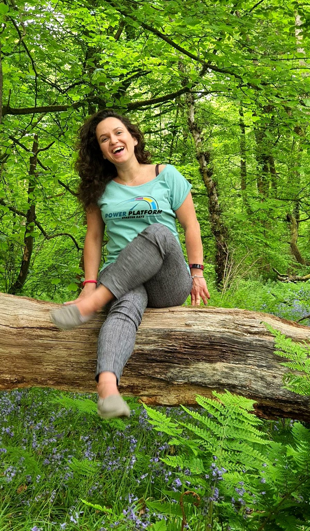 Dilyana Radulova sitting on a tree